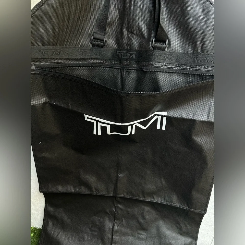 Tumi Travel Garment Bag black suits and dresses, during travel NEW 52” long 23”